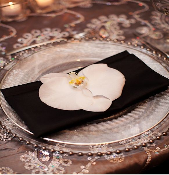 Black Napkin with Orchid Accent – shared by Preston Bailey