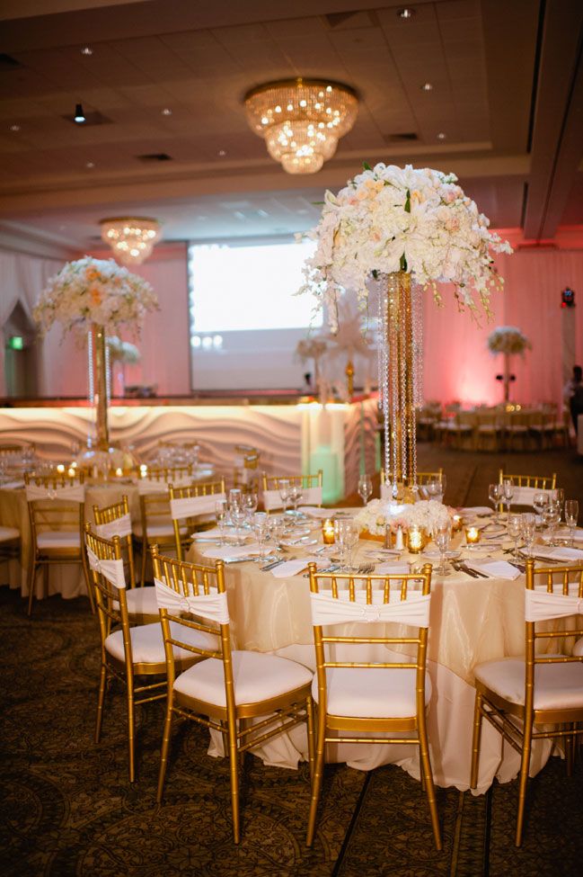 White, Crystals, and Gold Glamorous Centerpieces – shared on Storyboard Wedding