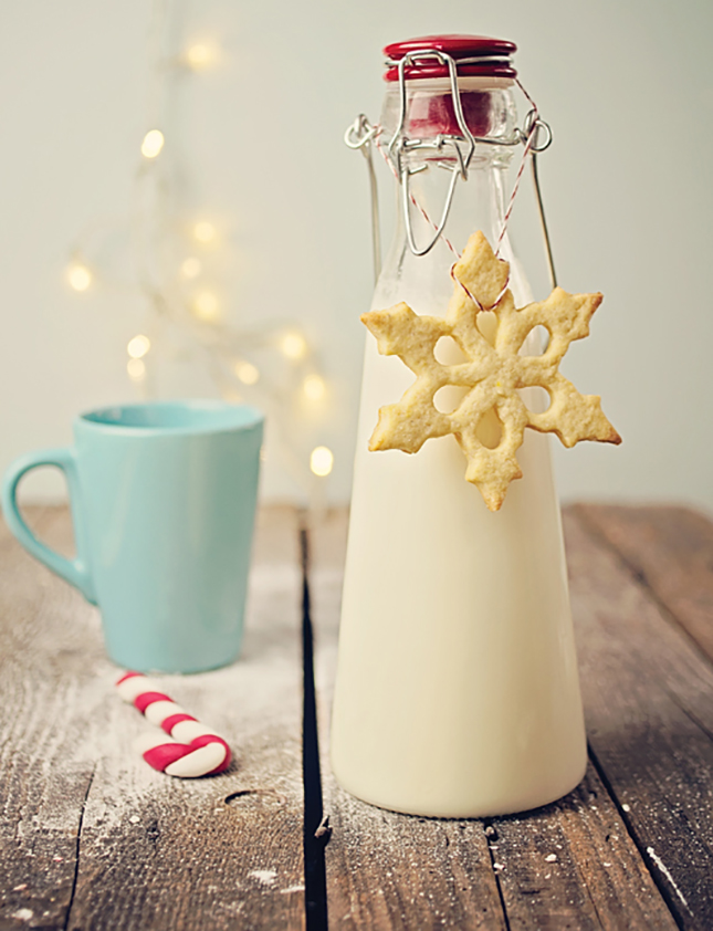 Snowflake Sugar Cookies and Milk – shared in a roundup post on Brit+Co