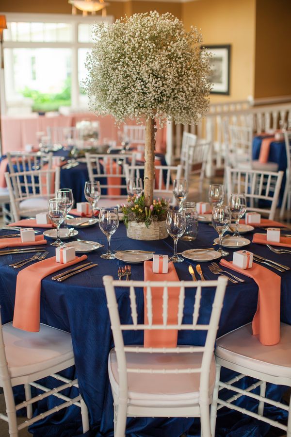 Navy and Coral Tablescape with Baby’s Breath – shared on Wedding Colors