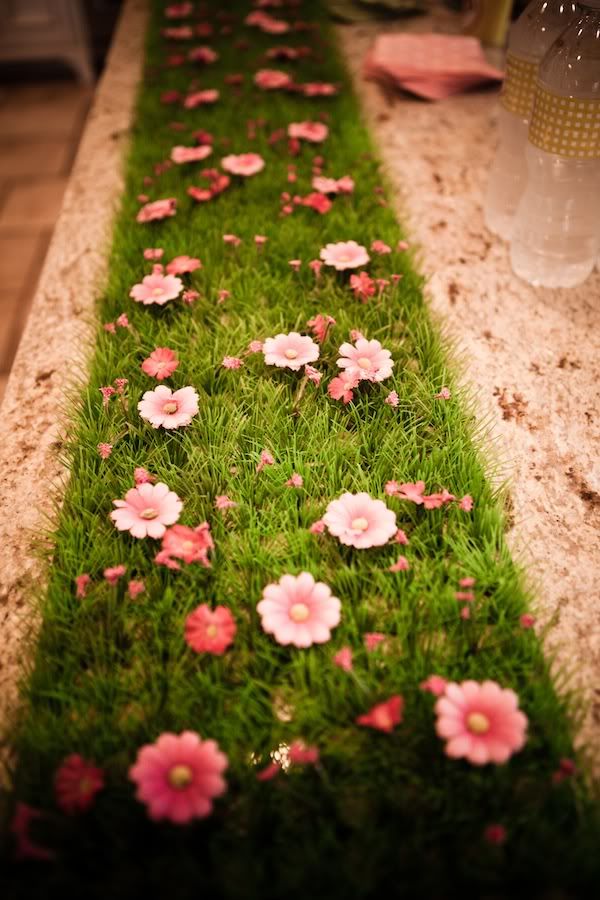 Pink Flowers on Green Grass Tablescape Décor – shared on P Is For Party