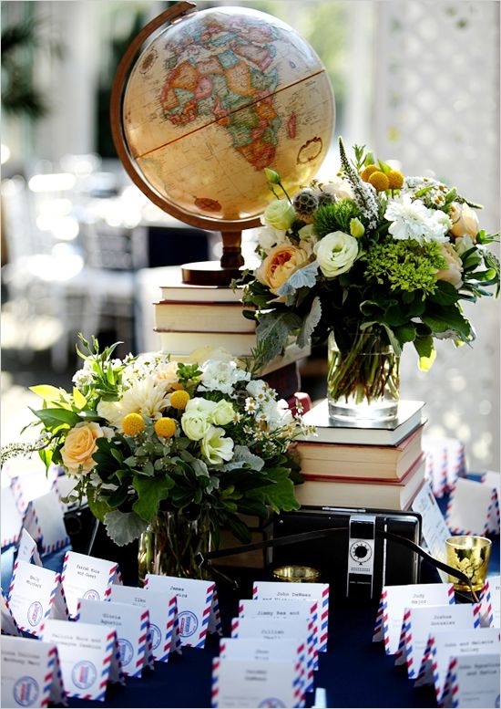 Escort Card Table with Globe and Florals – captured and shared by Ohana Photographers