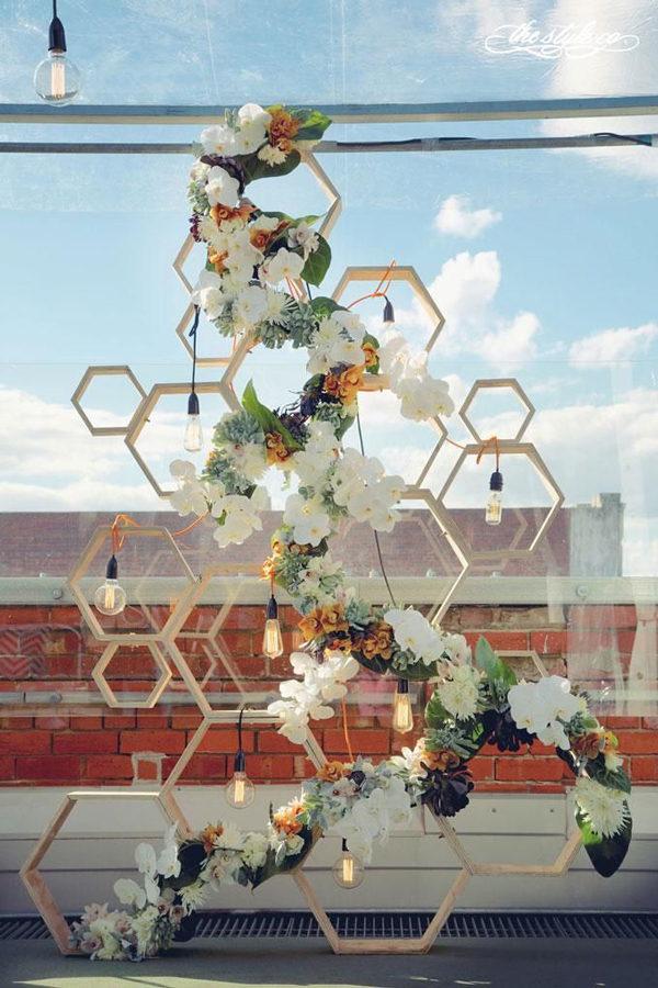 Honeycomb Wedding Ceremony Backdrop – shared in a roundup post on Royal Lace Bridal