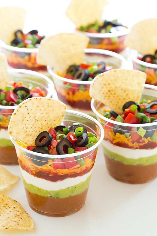 Individual 7 Layer Bean Dips – recipe shared on Cooking Classy