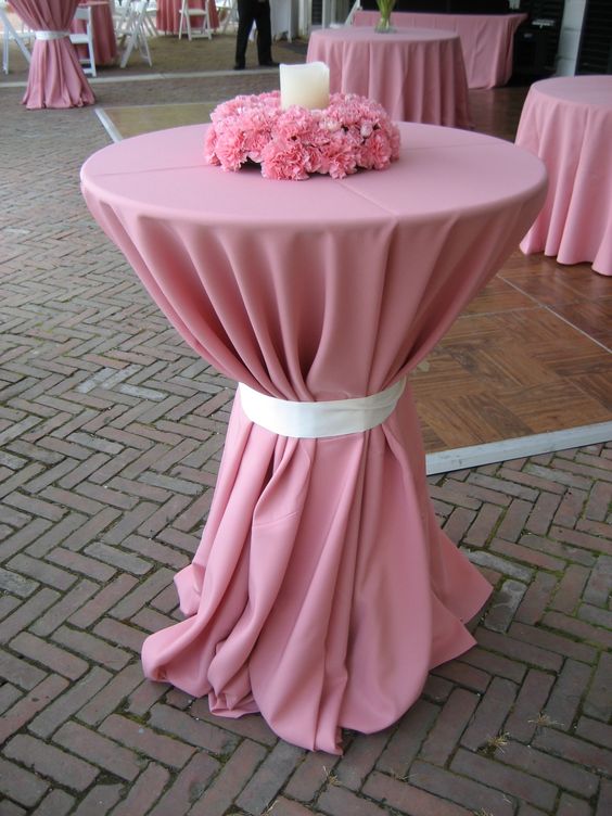 Pink Cocktail Tables with Pink Carnation Centerpiece Wreath – spotted on Pinterest