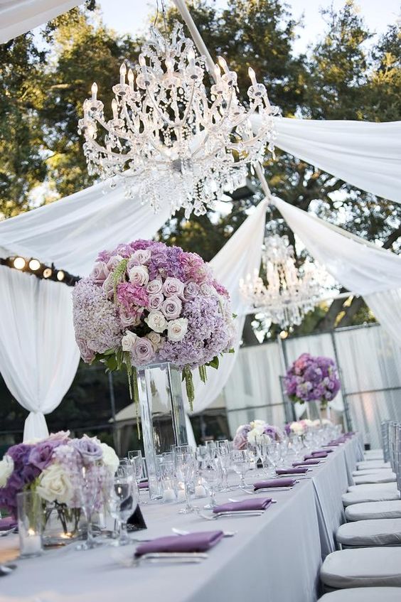 Purple and White Tent Tablescape with Crystal Chandeliers – shared on Hostess with the Mostess by Fresh Events Company