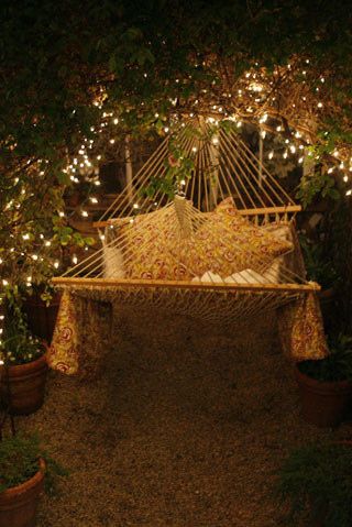 Hammock Swing Surrounded by Vines and Fairy Lights