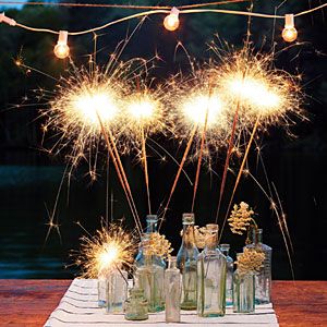 Sparkler Centerpieces with Eclectic Vases – shared by Southern Living