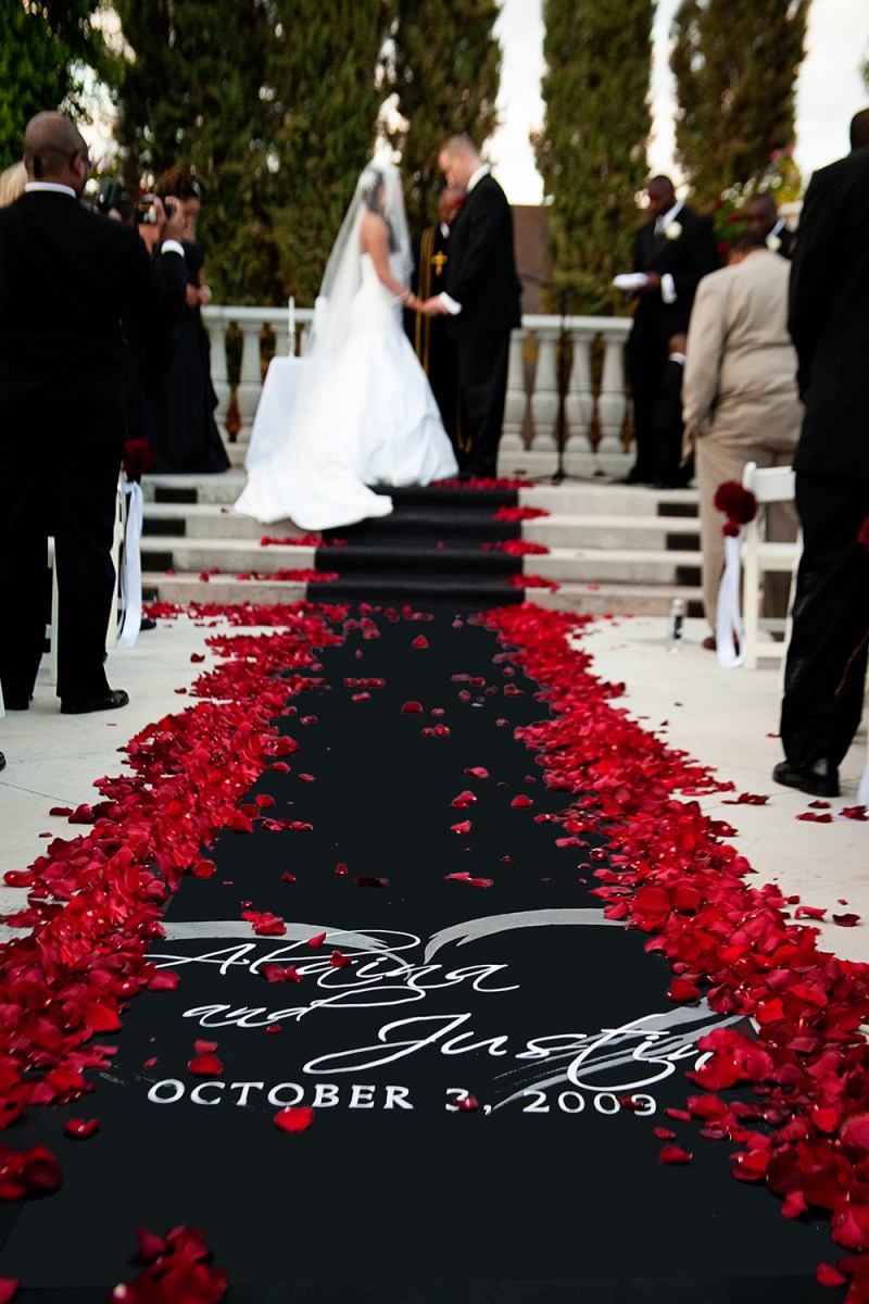 Black and Red Wedding Aisle Runner – shared in a roundup post by Wedding Newsday