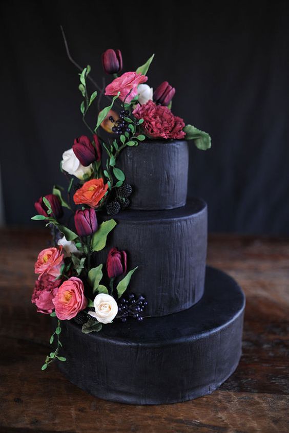 Black Tiered Cake with Flower Accents – featured on 100 Layer Cake
