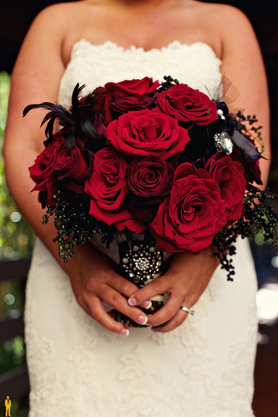 Gothic Wedding Bouquet with Red Roses and Black Feathers and Accents – shared on High Society Event Planning