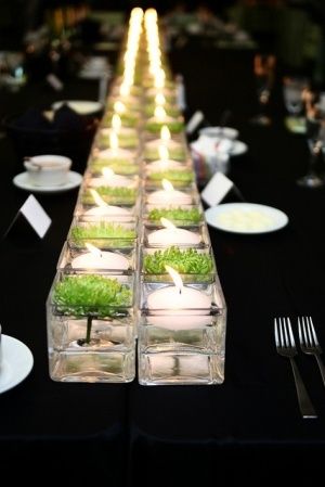 Simple Greenery Floral and White Candle Table Centerpiece – spotted on Pinterest