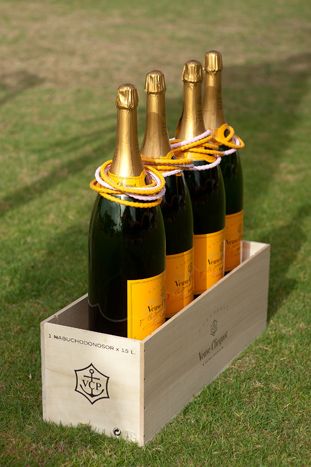 Oversized Champagne Bottle Ring Toss Game – shared on BizBash