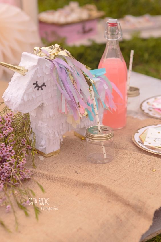 Unicorn Pinata Table Centerpiece – shared on Kara’s Party Ideas
