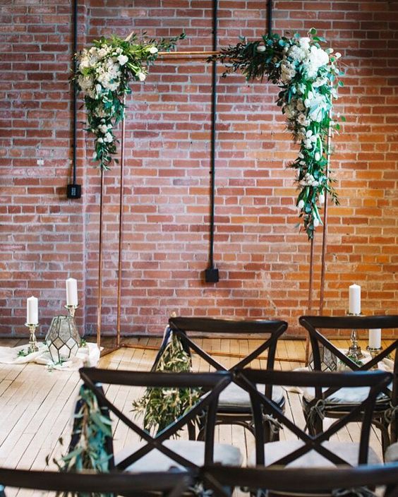 Industrial Wedding Arbor in Copper with Green and White Floral Accents – featured on Flowers by Janie