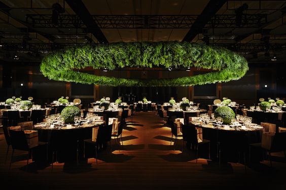 Oversized Green Foliage Ring Suspended Above the Dancefloor – shared on Azumamakoto