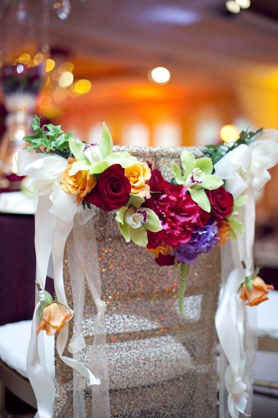 Chivari Chair with Sequin Cover and Colorful Wildflower Swag