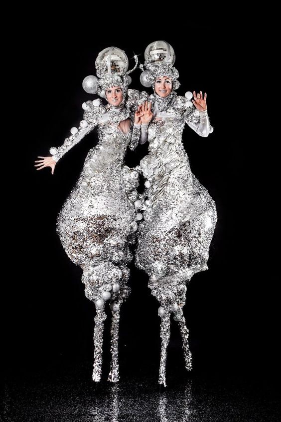 The Silver Belles Stilt Walkers with Disco Balls Event Entertainment – featured on Contraband