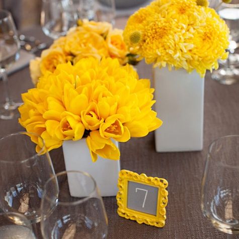 White Square Vases with Yellow Flower Arrangements – also shared on The Knot