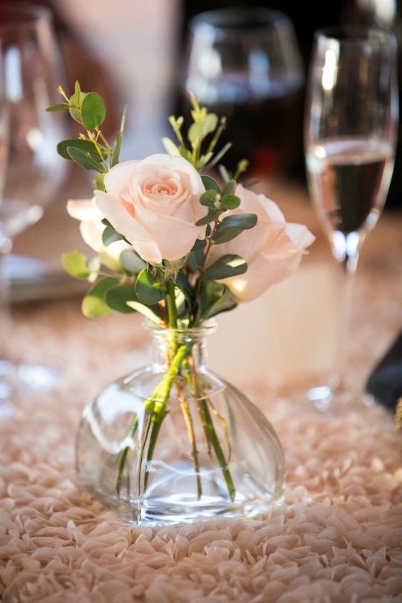 Simple Bud Vase Centerpiece with Blush Pink Roses on Blush Rosette Tablecloth Linen – shared on MODWEDDING