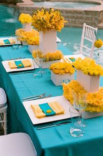 Yellow and White Centerpieces on Turquoise Tablescape – spotted on Pinterest